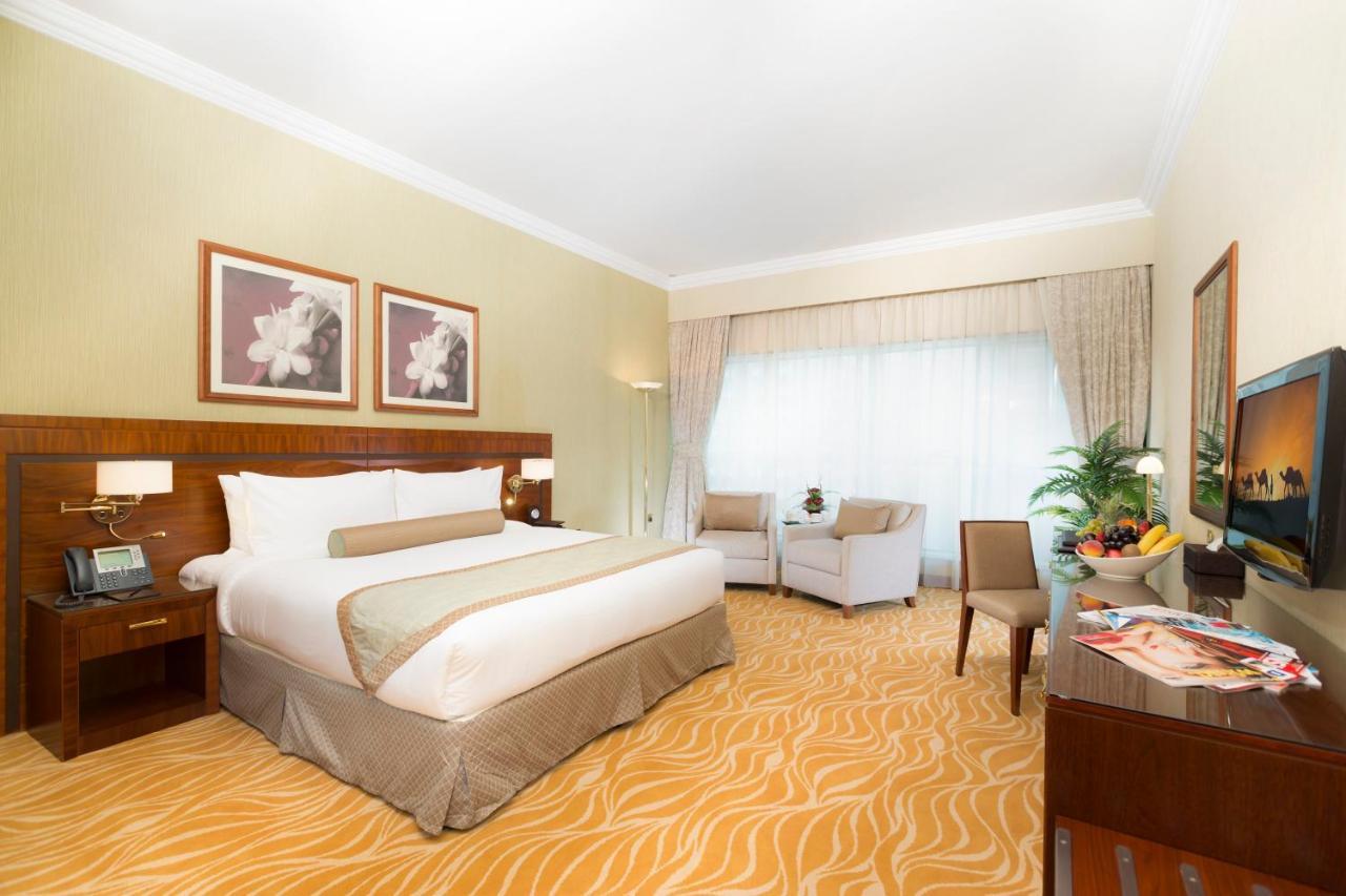 Grand Mercure Majlis Residences Abú Dhabí Exteriér fotografie A room at the hotel