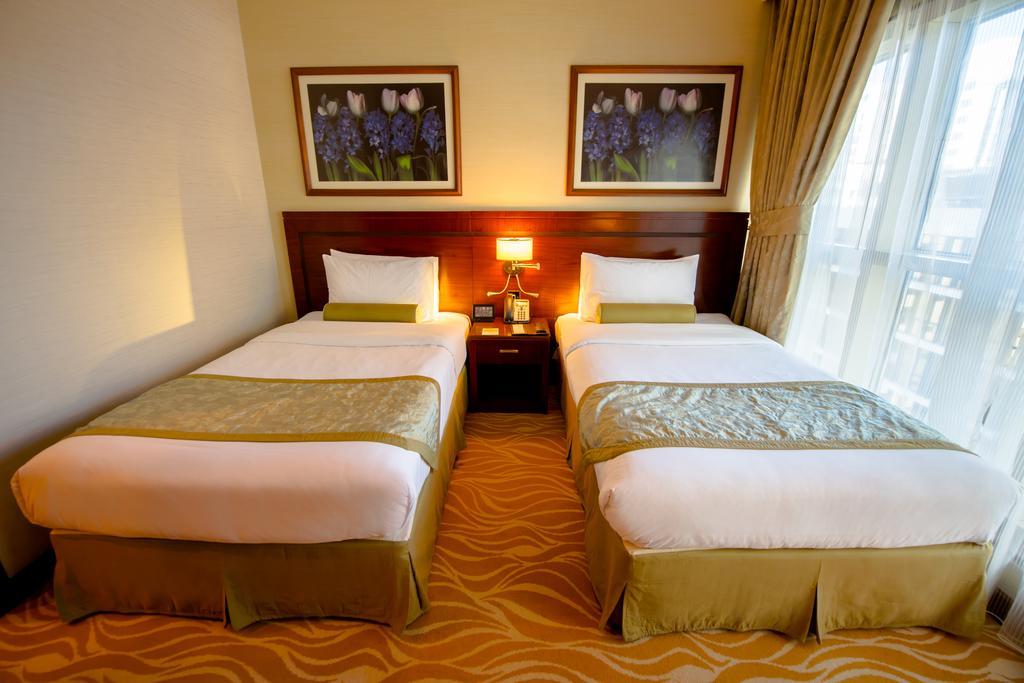 Grand Mercure Majlis Residences Abú Dhabí Exteriér fotografie A room at the hotel